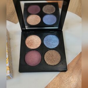 Pat McGrath Eyeshadow Palette with Blue, Purple, Gold, and Brown